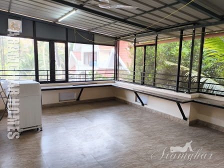 Spacious upstairs hall for family gatherings in Thellakom villa